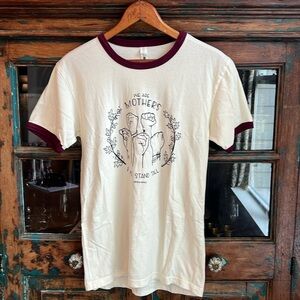 Grins & Grace T-Shirt XS Unisex
“We are Mothers”
70’s ringer vintage style